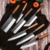 SXL-13 New arrival high carbon steel knife set with hammer design,Black bullhorn + red acid vulture handle, blade material stainless clad steel 3 layer